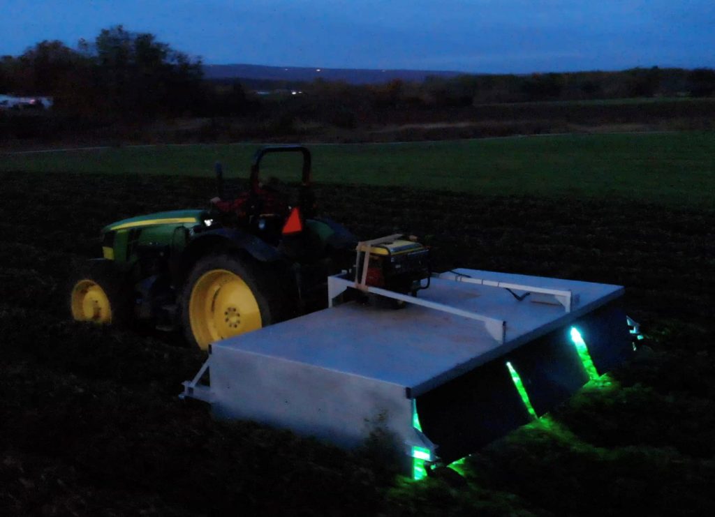 UV-C tractor-drawn wheeled equipment for UV treatments at a nursery in Nova Scotia, Canada. 