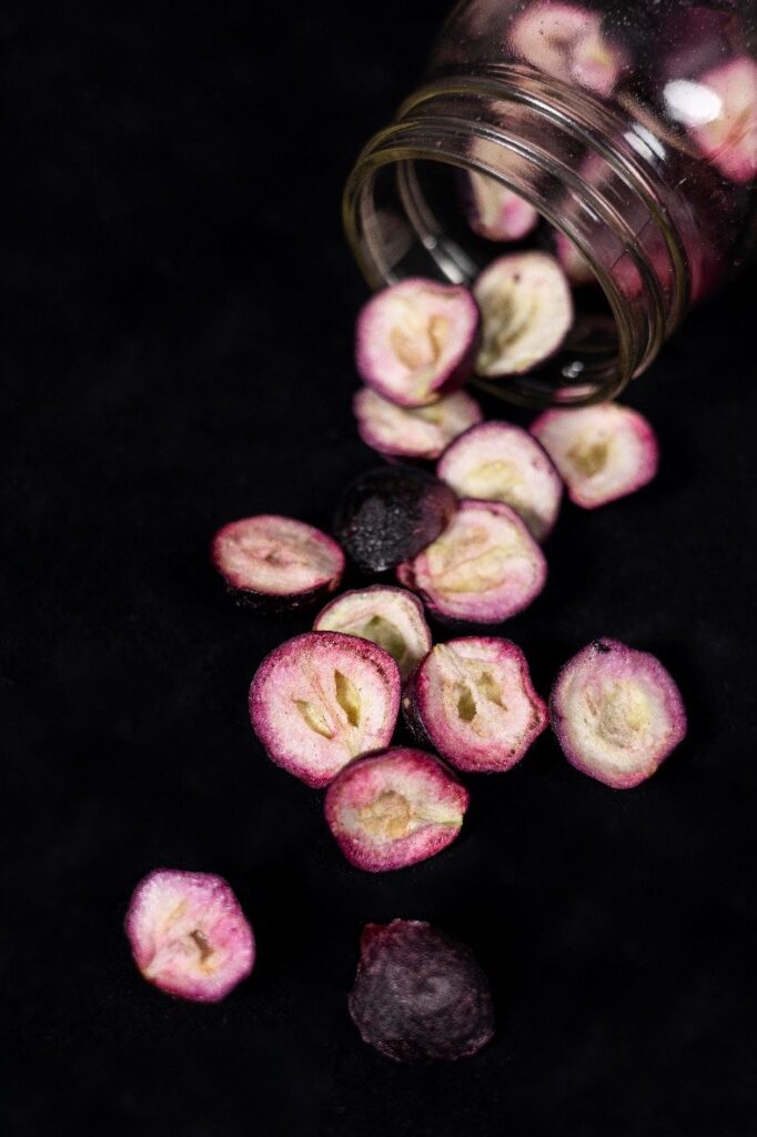 Freeze-dried black muscadine berries were halved and the seeds removed prior to freeze-drying.